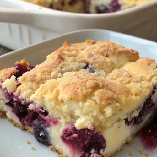 Blueberry Cheesecake Dump Cake: 5 Easy Steps To Make It 7 A delicious Blueberry Cheesecake Dump Cake with a golden, crumbly topping and a rich, creamy cheesecake layer.